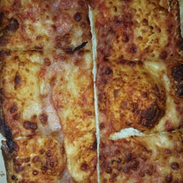 Bare spots... burnt crust... giant bubbles... hardly any cheese! Bare spots... burnt crust... giant bubbles... hardly any cheese!
