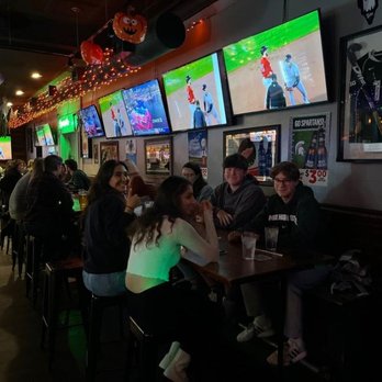 Lou & Harry's - a group of people sitting at a bar - Burgers Near Me - East Lansing, Michigan Lou & Harry's - a group of people sitting at a bar - Burgers Near Me - East Lansing, Michigan