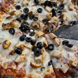Pizza (Cheese pizza adding chicken and olives) Pizza (Cheese pizza adding chicken and olives)