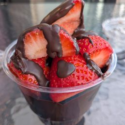 Strawberry cup with chocolate shell. Not a good combination. This would be great with chocolate sauce.
