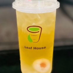 Leaf House - Green lychee tea with popping boba.