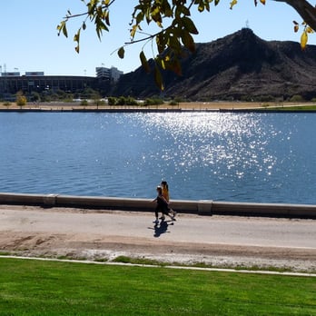 Tempe Town Lake - Joggers at the north shore of the Town Lake, January 2011. - Lakes Near Me - Tempe, Arizona Tempe Town Lake - Joggers at the north shore of the Town Lake, January 2011. - Lakes Near Me - Tempe, Arizona