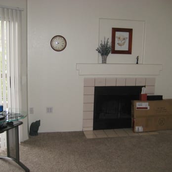 Ventana Apartments - There's only one functional wall in the Living Room area of apartments with a fireplace. - Apartments Near Me - Scottsdale, Arizona Ventana Apartments - There's only one functional wall in the Living Room area of apartments with a fireplace. - Apartments Near Me - Scottsdale, Arizona