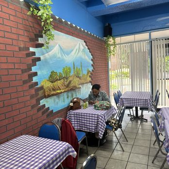 Leo's Taverna - My daughter waiting for our lunch. - Greek Near Me - Honolulu, Hawaii