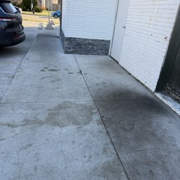 Nasty stains on the concrete at each door Nasty stains on the concrete at each door