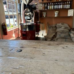 a coffee grinder in the background a coffee grinder in the background