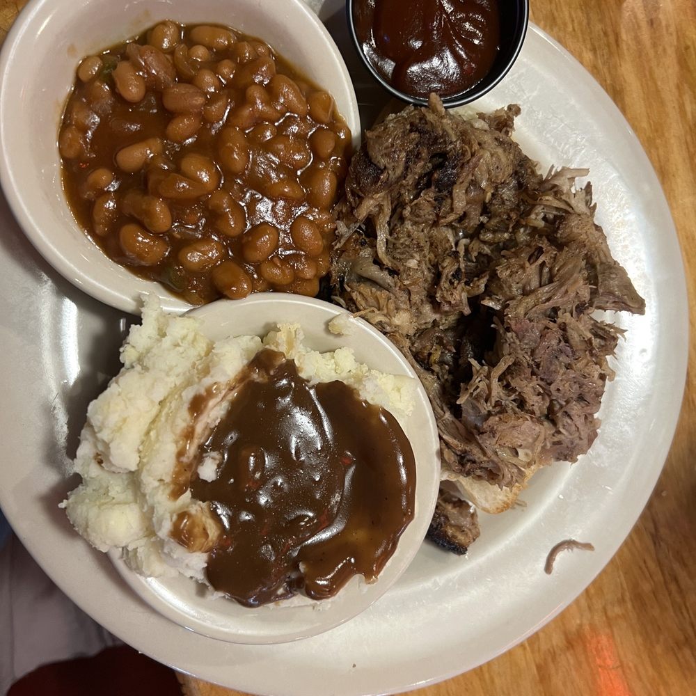 Logan's Roadhouse - BBQ Baked Beans, Pulled Pork with Bbq sauce, Mashed Potatoes with Beef Gravy - American Near Me - Midland, Michigan Logan's Roadhouse - BBQ Baked Beans, Pulled Pork with Bbq sauce, Mashed Potatoes with Beef Gravy - American Near Me - Midland, Michigan