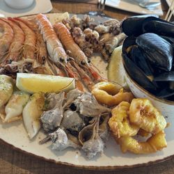 El Pósit - Sea food plate, sangria and bread with tomato delicious and excellent service by the beach on the Mediterranean you can't go wrong