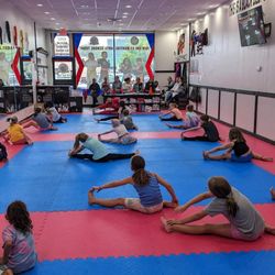Champions Martial Arts Hicksville - Girls Scouts working on their Self Defense