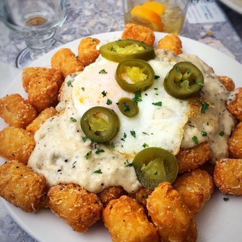 Logan's Alley - The Hang Over Tots. Really great! I'd add crumbled bacon... - Pubs Near Me - Grand Rapids, Michigan Logan's Alley - The Hang Over Tots. Really great! I'd add crumbled bacon... - Pubs Near Me - Grand Rapids, Michigan
