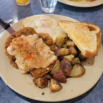 Downtown Diner - Chicken fried steak, two over easy eggs, fantastic potatoes and white toast. The sausage gravy was so good - Diners Near Me - Lake Placid, New York Downtown Diner - Chicken fried steak, two over easy eggs, fantastic potatoes and white toast. The sausage gravy was so good - Diners Near Me - Lake Placid, New York