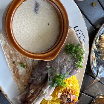 Luxor - Lamb shank with goat milk sauce - Mediterranean Near Me - San Antonio, Texas Luxor - Lamb shank with goat milk sauce - Mediterranean Near Me - San Antonio, Texas