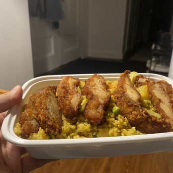 Rod D by Sitti - Crispy chicken over pineapple fried rice - Thai Near Me - Brookline, Massachusetts Rod D by Sitti - Crispy chicken over pineapple fried rice - Thai Near Me - Brookline, Massachusetts