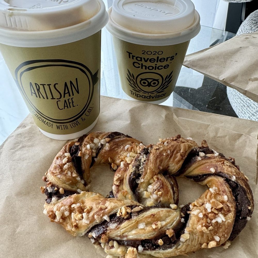 Artisan Cafe - The Hazelnut chocolate twist pastry & a flat white espresso. not pictured, the yummy oat bar & almond croissant. - Cafes Near Me - Rotorua, BOP Artisan Cafe - The Hazelnut chocolate twist pastry & a flat white espresso. not pictured, the yummy oat bar & almond croissant. - Cafes Near Me - Rotorua, BOP