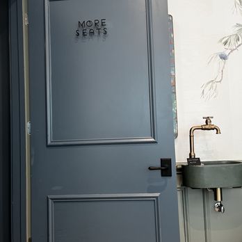The James Cafe - "More seats" sign and aesthetic filtered water dispenser - Coffee & Tea Near Me - Pittsburgh, Pennsylvania