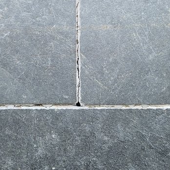 Cornerstone Construction and Remodeling - cracks in grout because there is no schluter or hardy board under the tile. Floor had to be replaced. - General Contractors Near Me - Durham, Connecticut