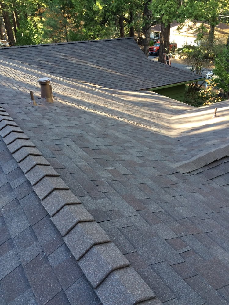 Slide of Kelly Roofing