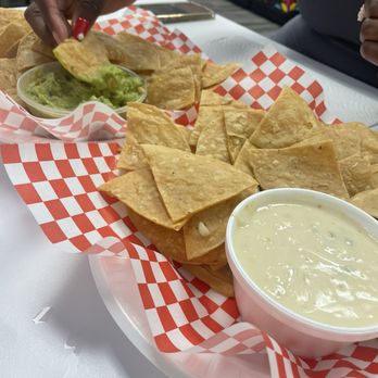 Catrina Grill - 8 oz. Chips and Queso, chips and 8 oz. Guacamole - Mexican Near Me - Lewisville, Texas
