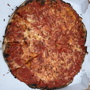 Sally's Apizza - Large cheese and tomato sauce pie - Pizza Near Me - New Haven, Connecticut Sally's Apizza - Large cheese and tomato sauce pie - Pizza Near Me - New Haven, Connecticut