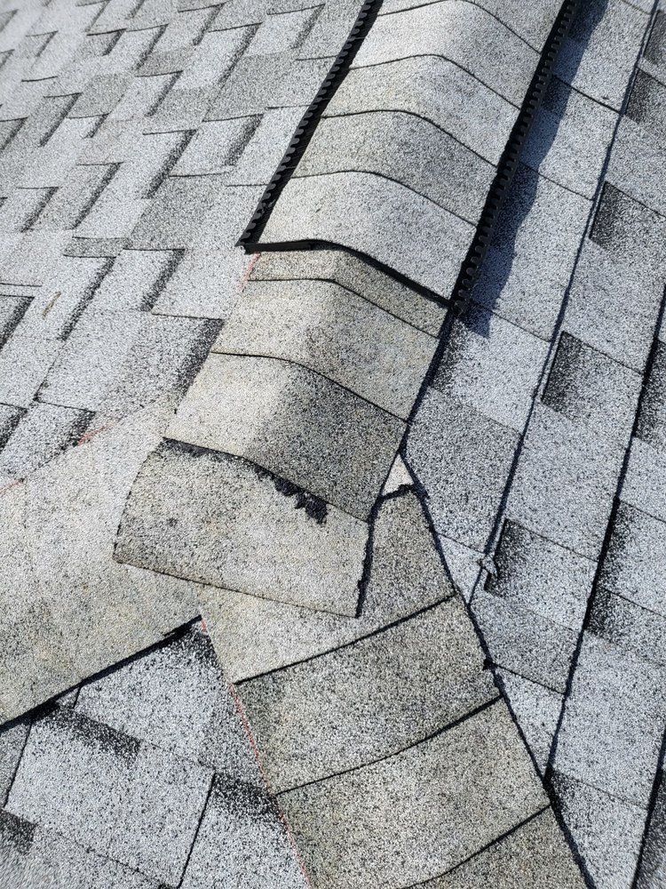 Slide of Treasure Coast Roofing