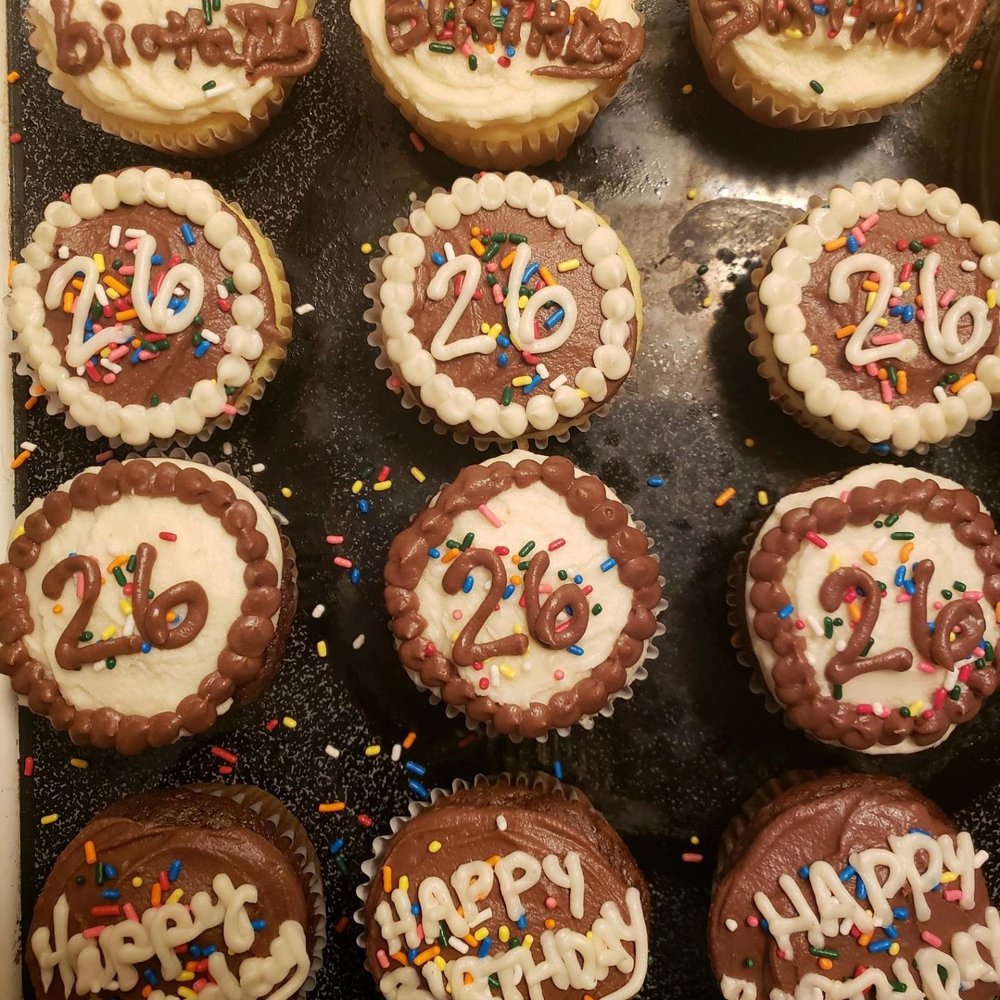 Crystal's Place Bakery - chocolate cupcakes with white frosting and sprinkles - Desserts Near Me Crystal's Place Bakery - chocolate cupcakes with white frosting and sprinkles - Desserts Near Me