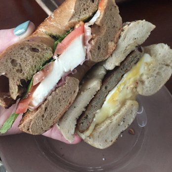 Wicked Bagel - Tuscan sandwich with pesto and prosciutto on wheat bagel and a sausage, egg, and cheese on everything bagel. - Bagels Near Me - Lexington, Massachusetts