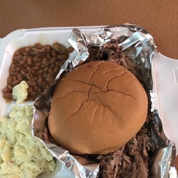 Smokin' Joe's BBQ - The most delicious and flavorful meal I've had in a while. BBQ pulled pork sandwich with potato salad and baked beans. Just Yummmmm!!! - Barbeque Near Me - Bowling Green, Florida