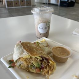 Iced chai latte and breakfast burrito