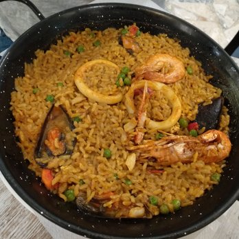 Cafeteria Florida - Seafood paella with shells. - Cafeteria Near Me - Barcelona, B Cafeteria Florida - Seafood paella with shells. - Cafeteria Near Me - Barcelona, B