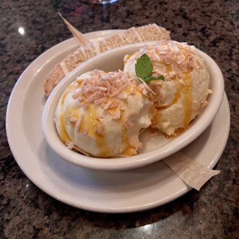 Wild Sage Bistro - Yummy coconut and kaffir lime ice cream with lilikoi sauce - New American Near Me - Spokane, Washington Wild Sage Bistro - Yummy coconut and kaffir lime ice cream with lilikoi sauce - New American Near Me - Spokane, Washington