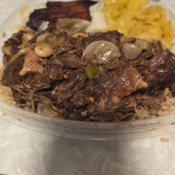 JG’s Jerk Grill - Oxtails on a bed of rice, Plantains, and Cabbage - Seafood Near Me - Hillside, Illinois JG’s Jerk Grill - Oxtails on a bed of rice, Plantains, and Cabbage - Seafood Near Me - Hillside, Illinois