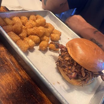 Twisted Pig Bar and Grill - Pulled pork Burger and tots - American Near Me - Modesto, California Twisted Pig Bar and Grill - Pulled pork Burger and tots - American Near Me - Modesto, California