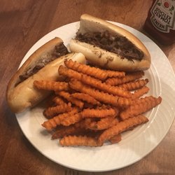 Philly Cheesesteak (no onions) with sweet potato fries.