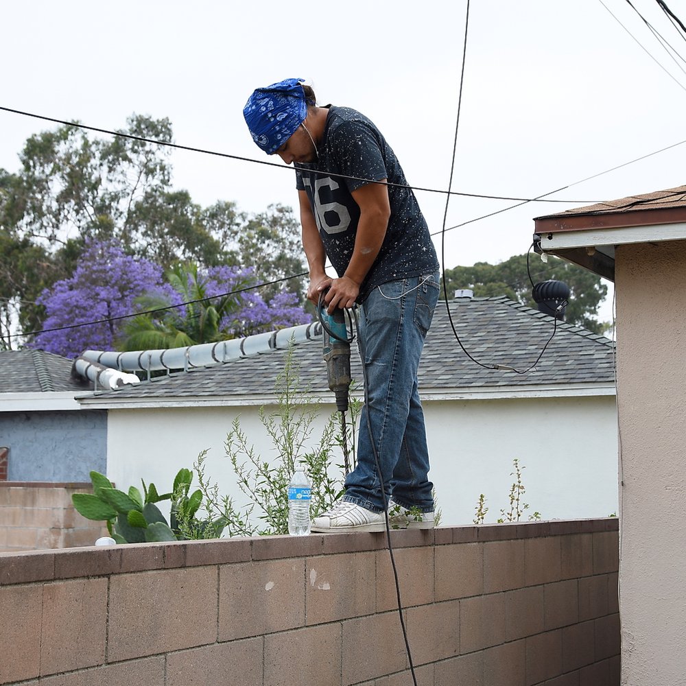 Nicks Vinyl Fence - Drilling some holes for anchoring - Fences & Gates Near Me - Montebello, California Nicks Vinyl Fence - Drilling some holes for anchoring - Fences & Gates Near Me - Montebello, California