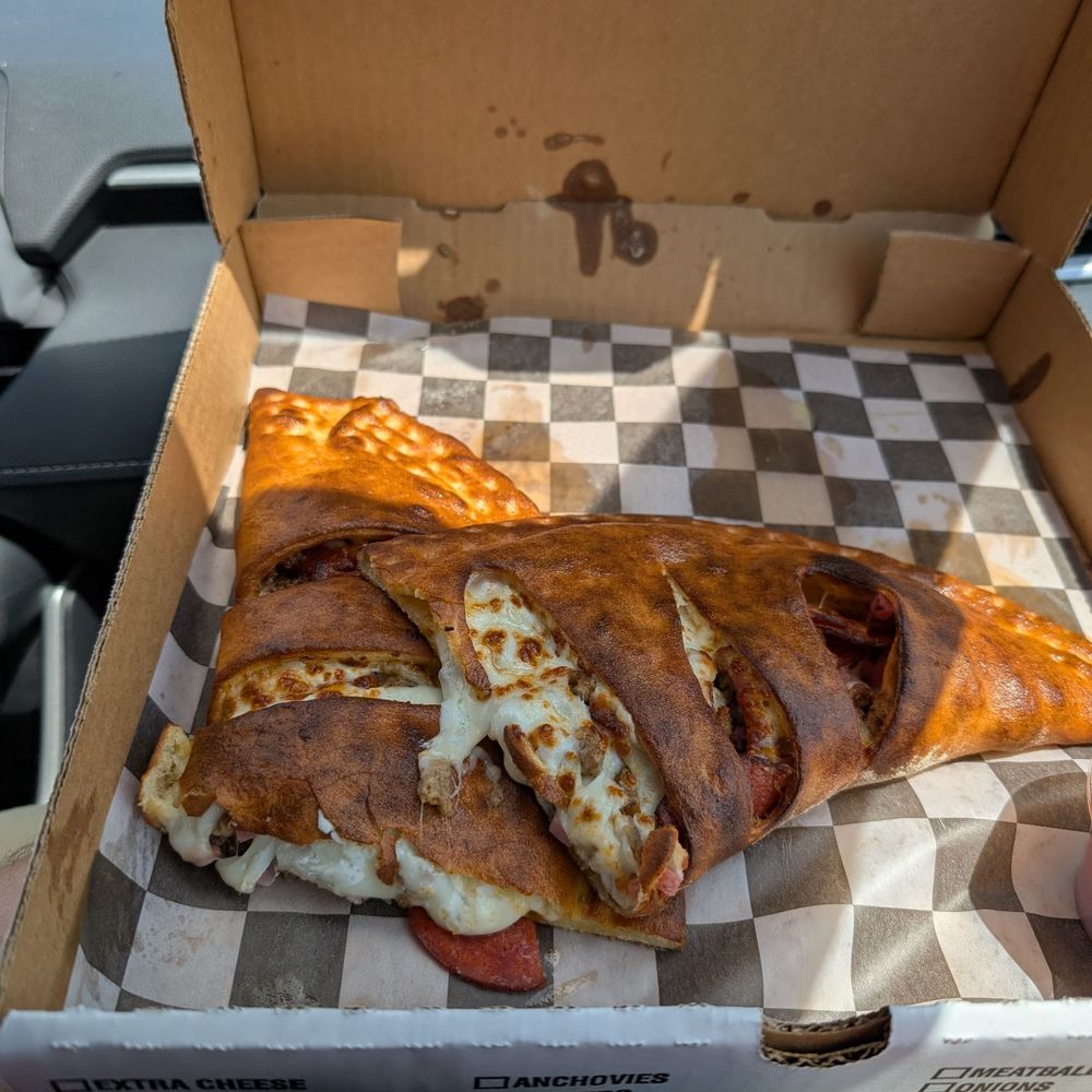 The original Bella's Pizzeria - Meat lovers calzone - Pizza Near Me - Yukon, Oklahoma The original Bella's Pizzeria - Meat lovers calzone - Pizza Near Me - Yukon, Oklahoma