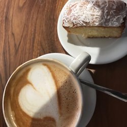 Aroma Espresso Bar - Almond milk espresso "made with love" by Donna and a moist coconut orange cake.
