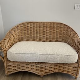 Oatmeal Boucle Fabric on natural rattan Oatmeal Boucle Fabric on natural rattan