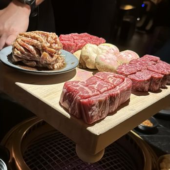 COTE - From top: American Wagyu, mushrooms, Prime Flatiron, Hangar Steak and Marinated Short Ribs - Steakhouses Near Me - Las Vegas, Nevada