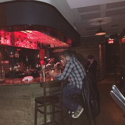 a man sitting at a bar a man sitting at a bar