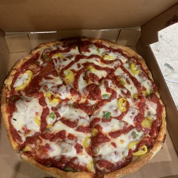 Paradise Pizza - Deluxe pan pizza without olives but with extra sauce and banana peppers - Pizza Near Me - Caledonia, Michigan