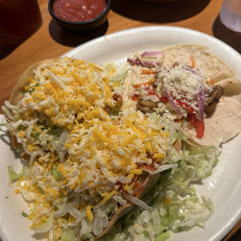 Shredded beef, chicken, and shrimp taco. Shredded beef, chicken, and shrimp taco.