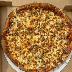 Mancinos Pizzas and Grinders - Medium thin crust pizza with pepperoni, mushrooms, and sausage.