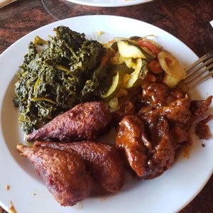 Photo of ELife Restaurant - Washington, DC, United States. Kale greens (bland), barbeque chik'n (delicious) and sauteed squash (must try),jerk chik'n
