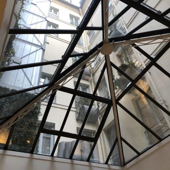 Select Hôtel Rive Gauche - Looking up atrium from main lobby. - Hotels Near Me - Paris, 75