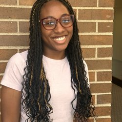 Chéz Délali Salon & Day Spa - Box braids with curly ends.