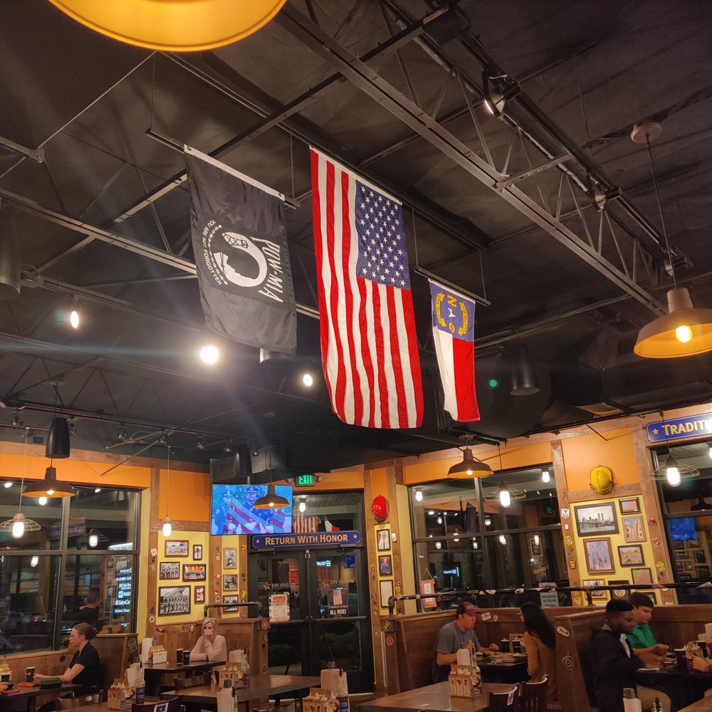 Mission BBQ - american flag hanging from the ceiling - Barbeque Near Me - Greenville, North Carolina Mission BBQ - american flag hanging from the ceiling - Barbeque Near Me - Greenville, North Carolina