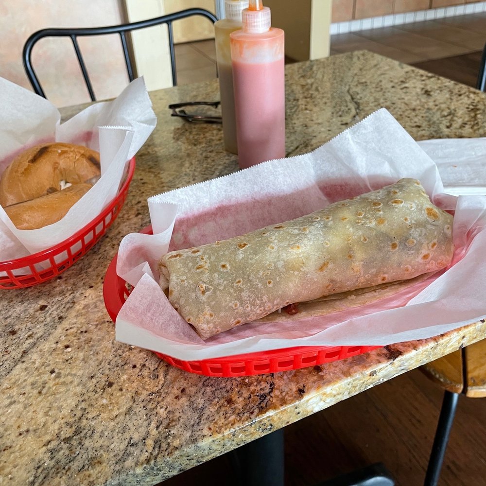 Vega Caffe Mexican Deli - two burritos on a table - Delis Near Me - Chula Vista, California Vega Caffe Mexican Deli - two burritos on a table - Delis Near Me - Chula Vista, California