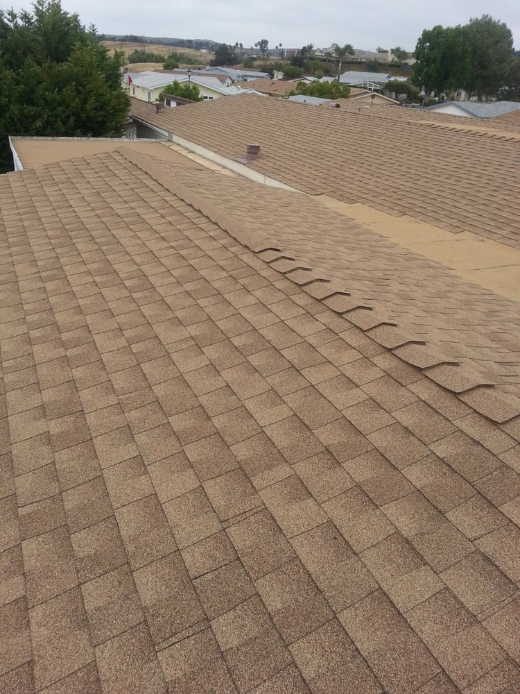 Slide of Sandoval Roofing