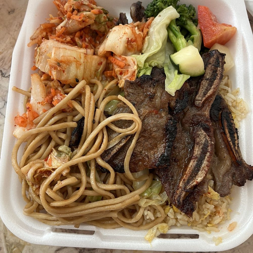 Seoul Express - Fried rice, chow mein, Kim chee, and veggies platter. - Korean Near Me - Sacramento, California
