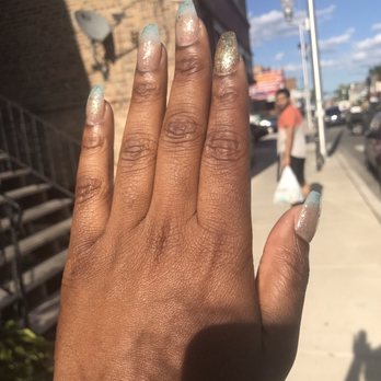 Jasmine's Boutique - Gel mood changing polish. It's has gold glitter. Clear when it's warm, blue when it's cool. It's ombré some times! - Nail Salons Near Me - Chicago, Illinois